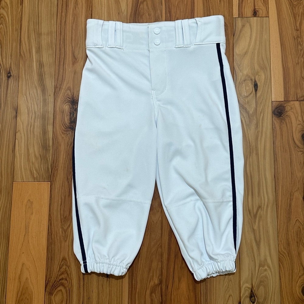 Champro YM White baseball Knickers with Navy Blue piping down the sides.